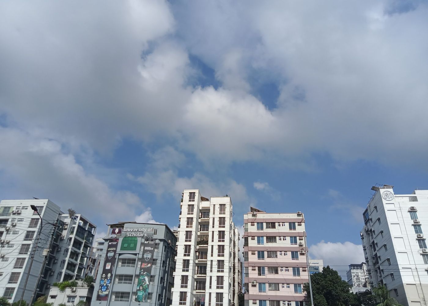 Apartment buildings against a summer sky